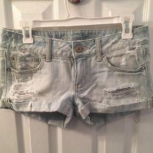 Distressed faded jean shorts